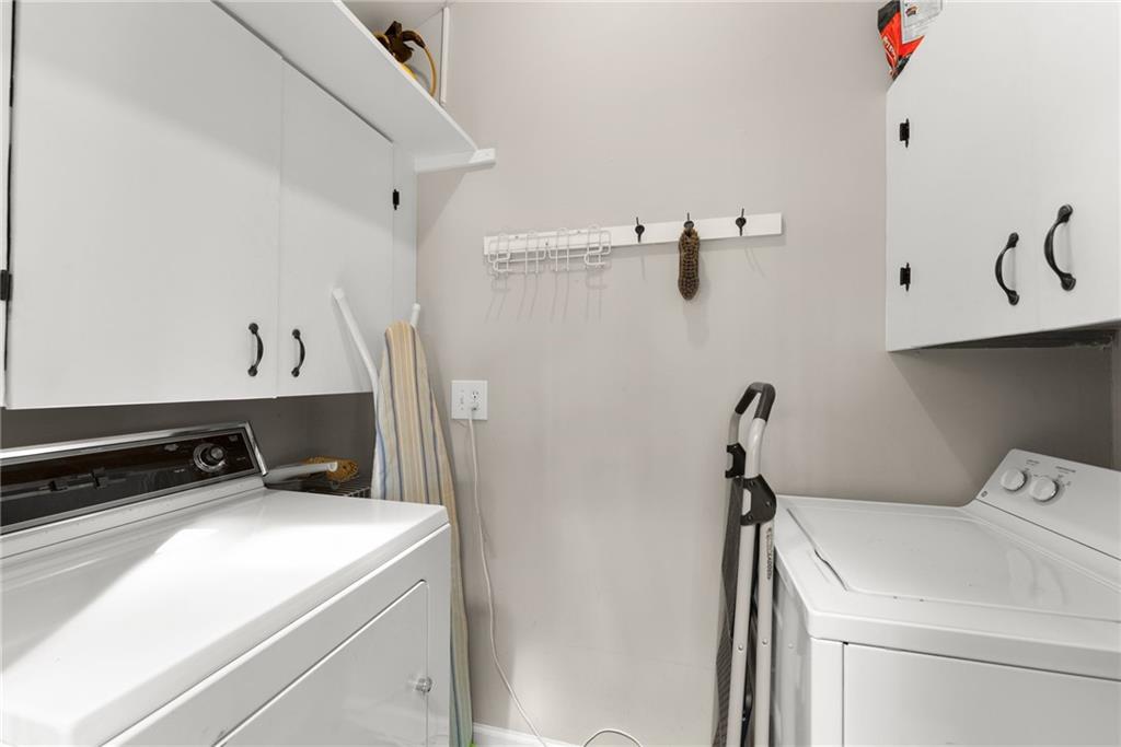 28 Little Hendricks Mountain Road Jasper, GA 30143 - Photo 12 of 50 a utility room with dryer and washer