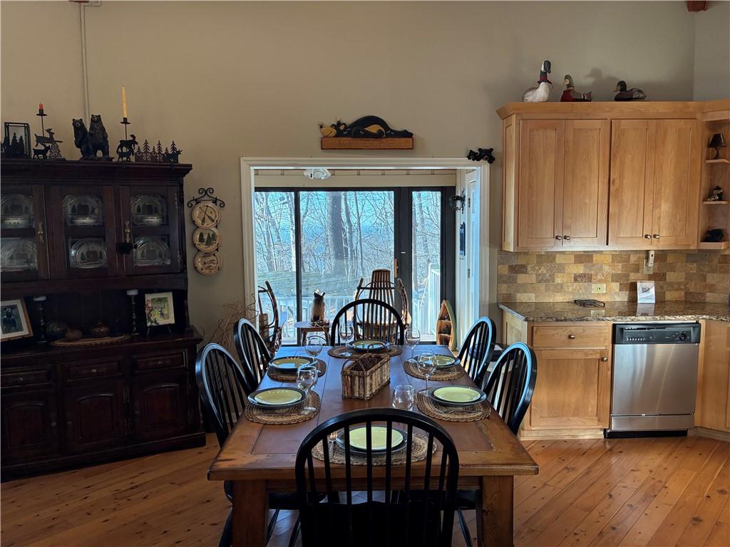 28 Little Hendricks Mountain Road Jasper, GA 30143 - Photo 14 of 42 a view of a dining room with furniture and wooden floor