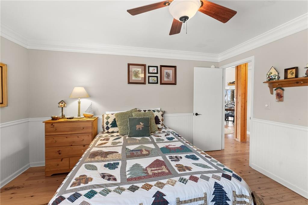 28 Little Hendricks Mountain Road Jasper, GA 30143 - Photo 15 of 50 a bed room with a bed and a lamp