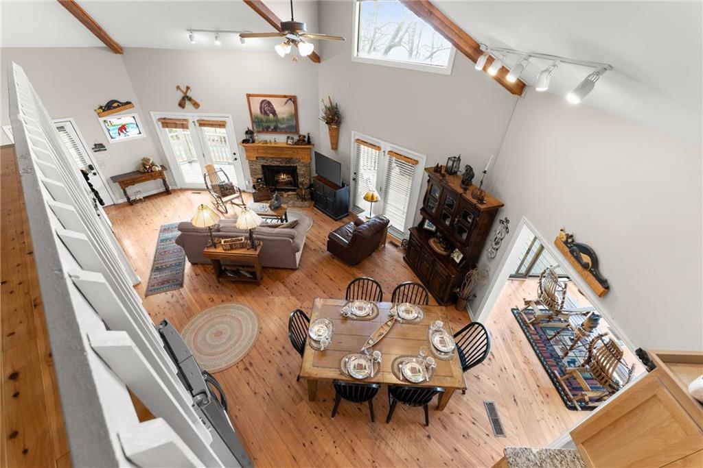 28 Little Hendricks Mountain Road Jasper, GA 30143 - Photo 20 of 50 a living room with furniture and wooden floor