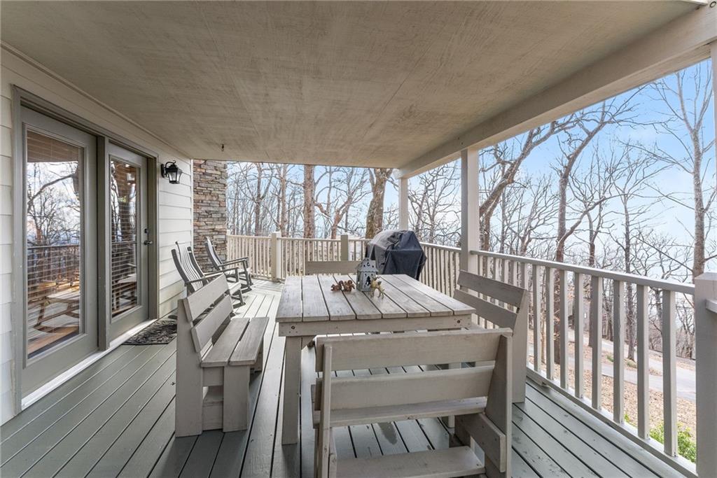 28 Little Hendricks Mountain Road Jasper, GA 30143 - Photo 24 of 50 a view of a balcony with table and chairs