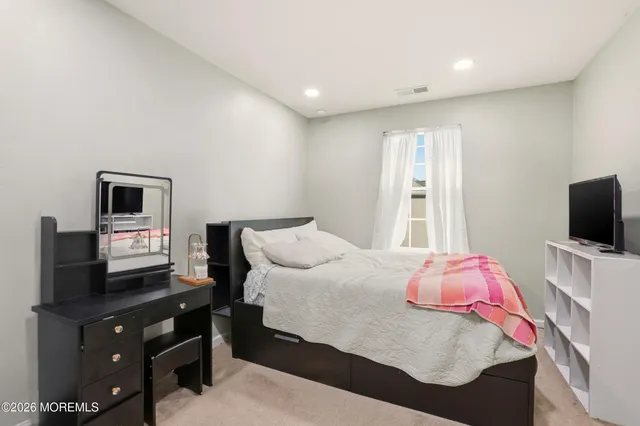 a workspace with furniture and a window