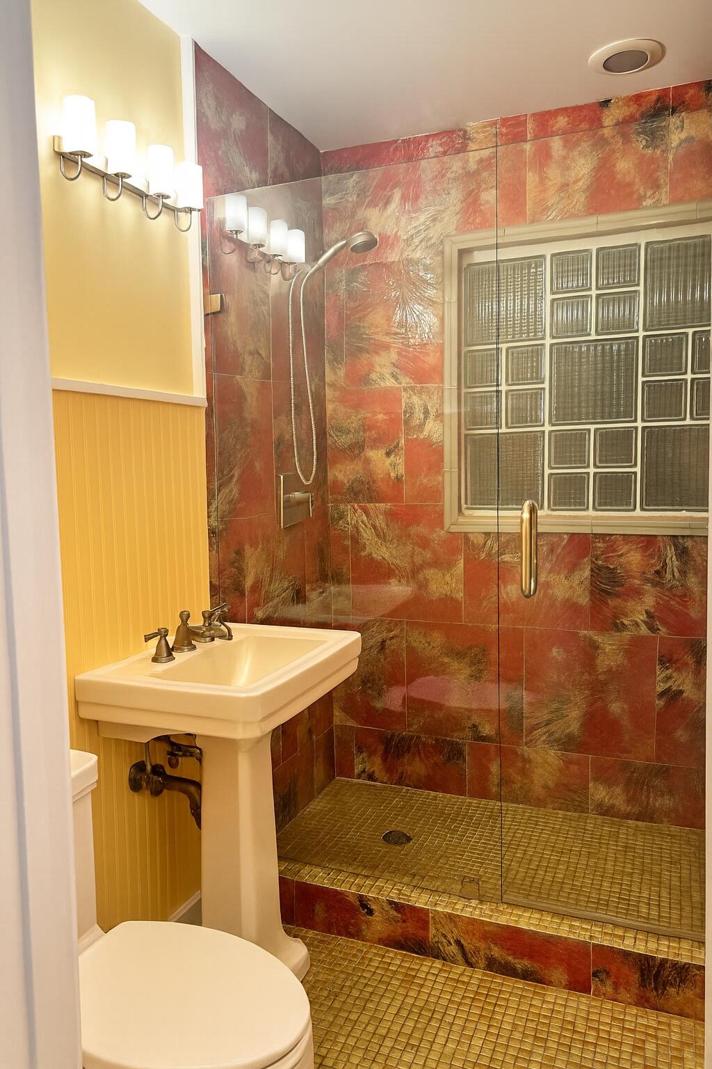 810 Bamboo Lane Delray Beach, FL 33483 - Photo 14 of 30 a bathroom with a sink toilet and shower