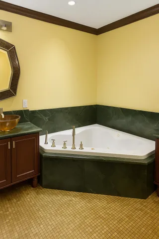 a bathroom with a bathtub and a sink