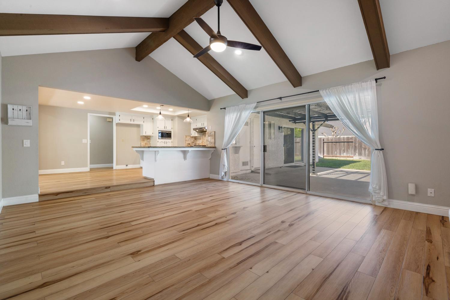 3317 Shamrock Avenue Merced, CA 95340 - Photo 15 of 44 a view of empty room with wooden floor
