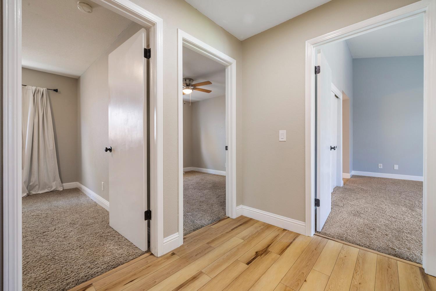 3317 Shamrock Avenue Merced, CA 95340 - Photo 19 of 44 a view of hallway with wooden floor