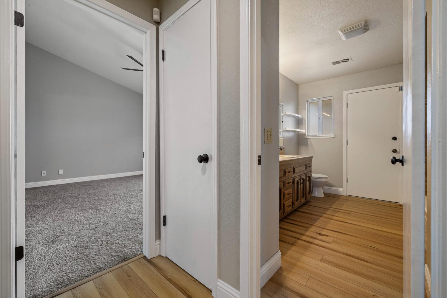 3317 Shamrock Avenue Merced, CA 95340 - Photo 23 of 44 a view of a bathroom from the hallway