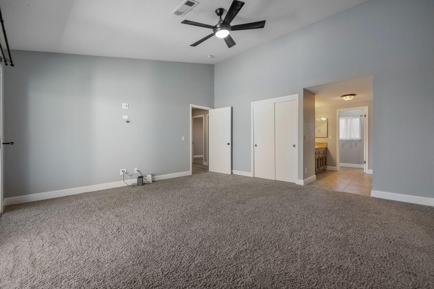 3317 Shamrock Avenue Merced, CA 95340 - Photo 27 of 44 an empty room with closet and windows