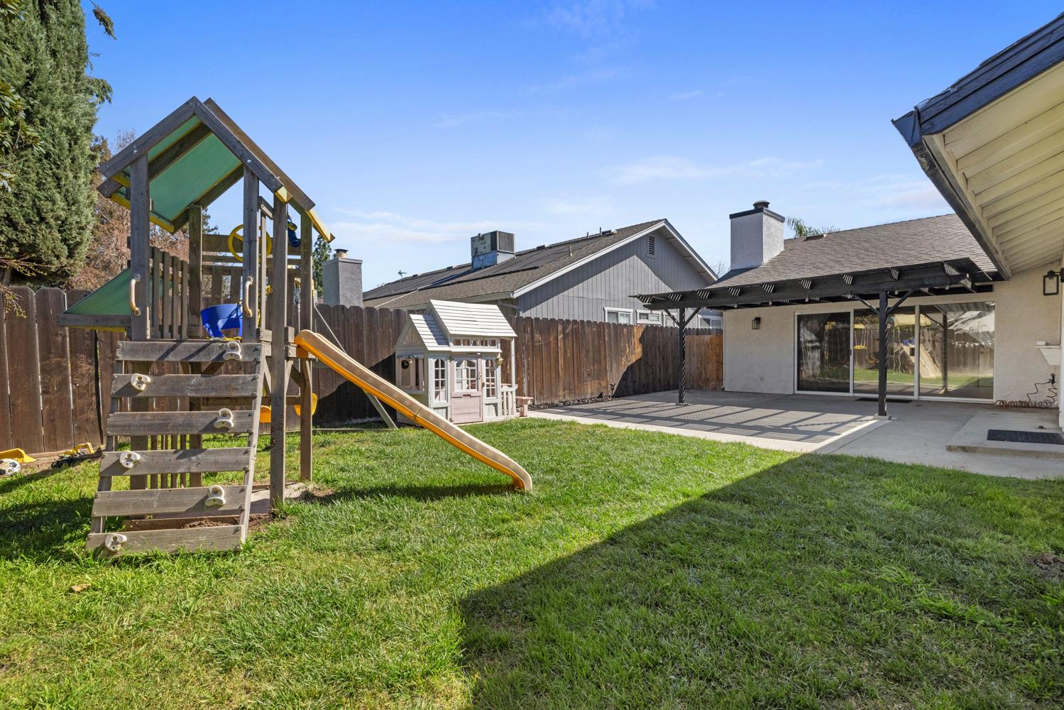 3317 Shamrock Avenue Merced, CA 95340 - Photo 33 of 44 a front view of a house with a yard