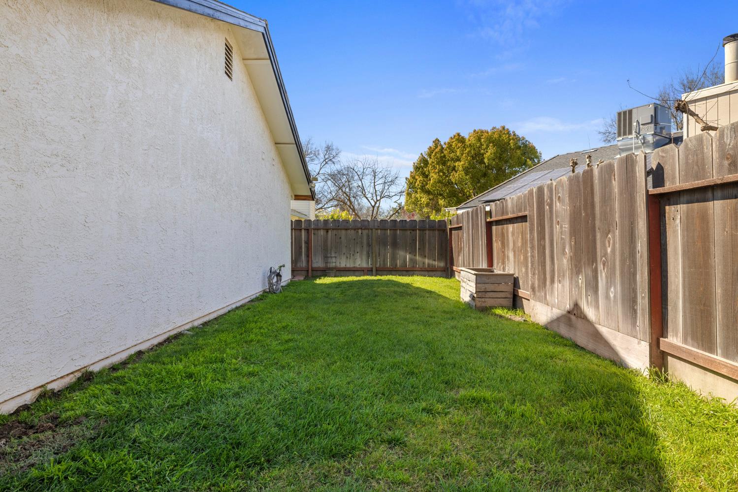 3317 Shamrock Avenue Merced, CA 95340 - Photo 34 of 44 a view of a back yard with a small barn