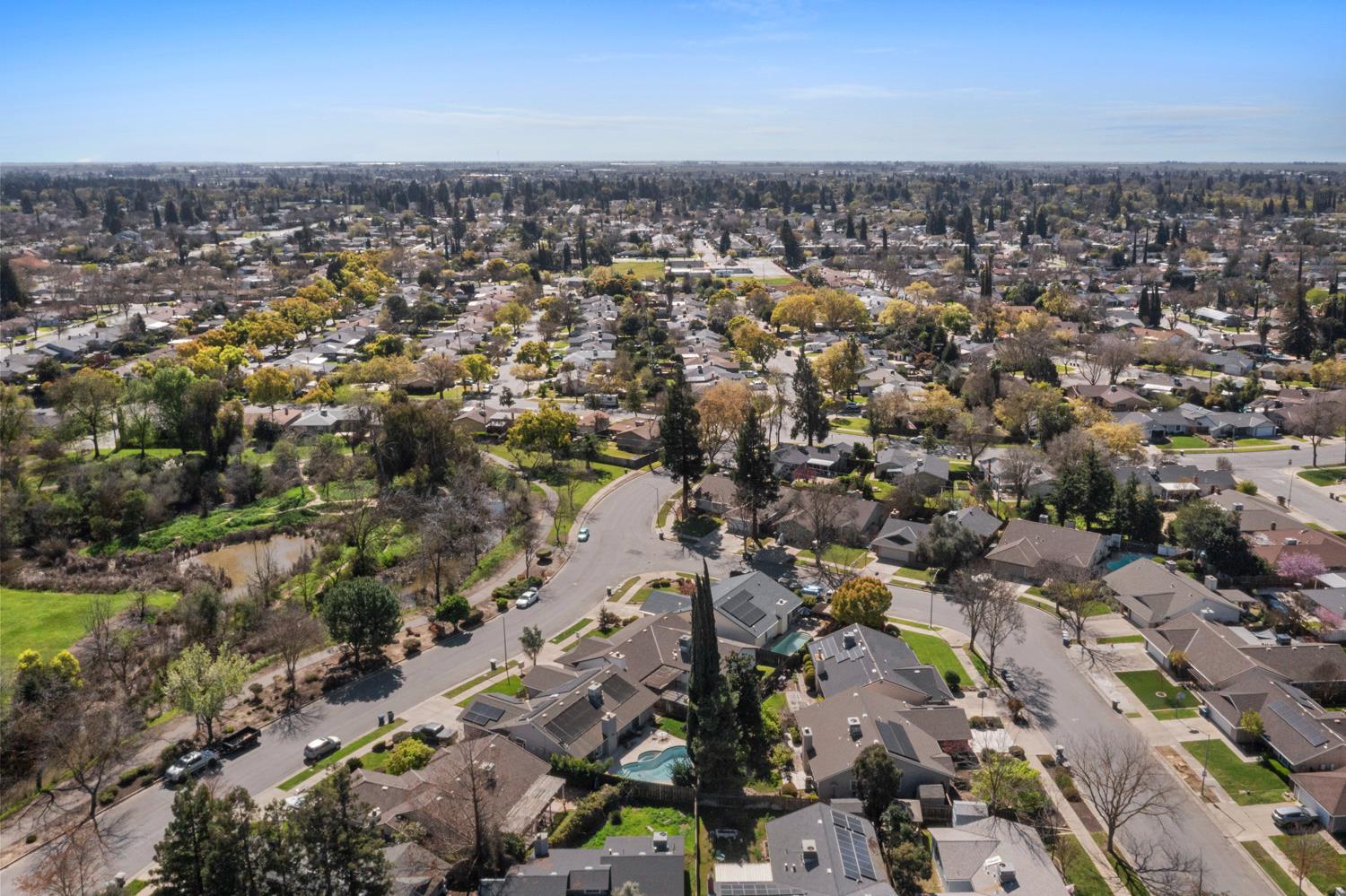 3317 Shamrock Avenue Merced, CA 95340 - Photo 40 of 44 an aerial view of a city with lots of residential buildings