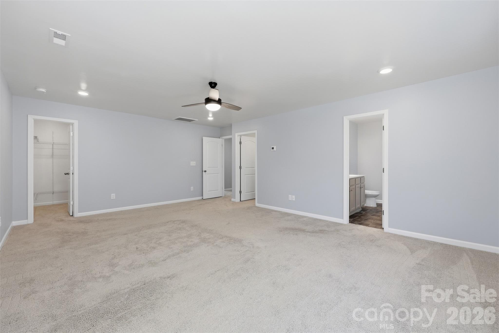 2220 Sussex Road York, SC 29745 - Photo 22 of 42 a view of an empty room with a chandelier fan