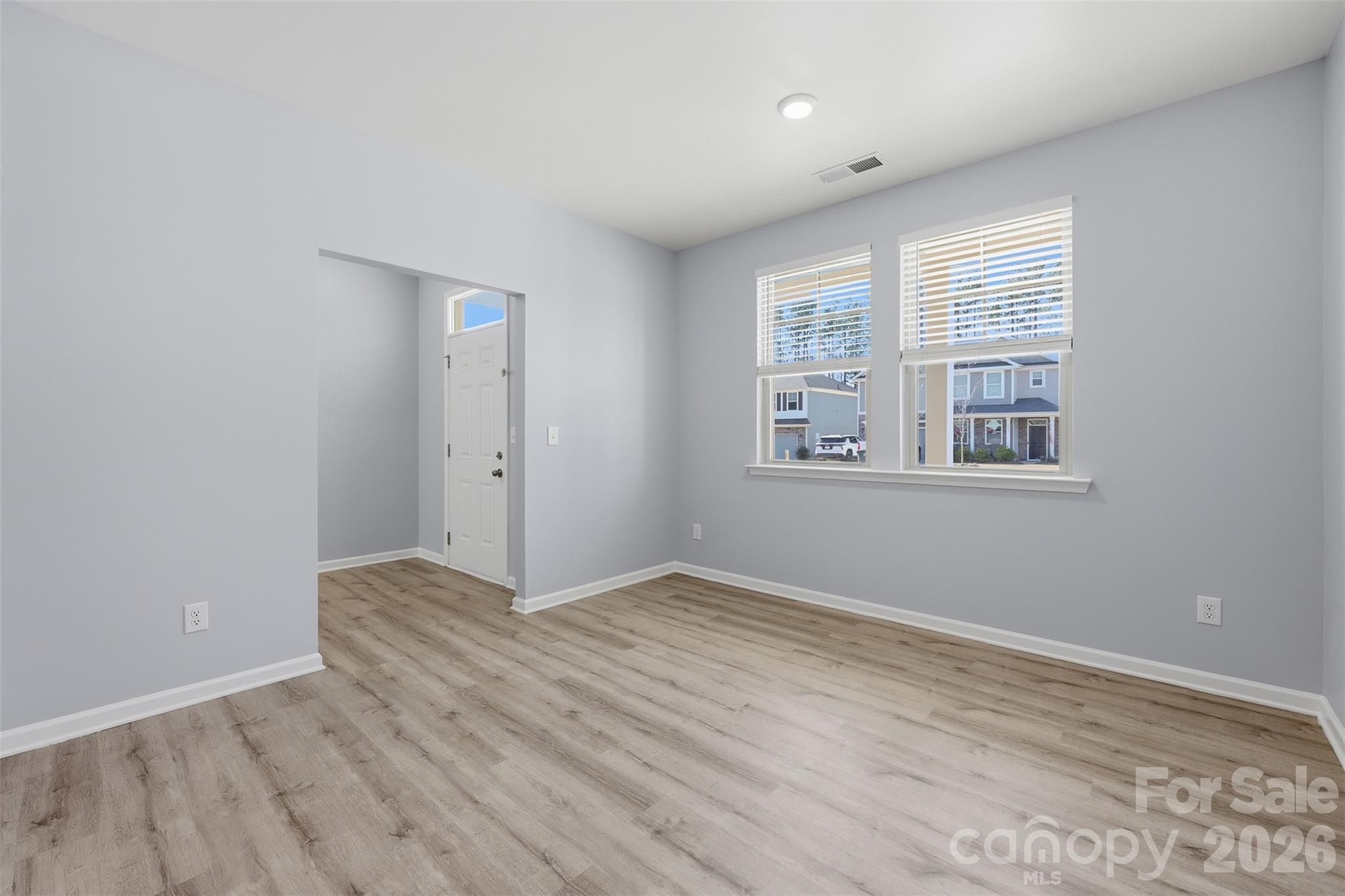 2220 Sussex Road York, SC 29745 - Photo 5 of 42 a view of empty room with wooden floor and fan