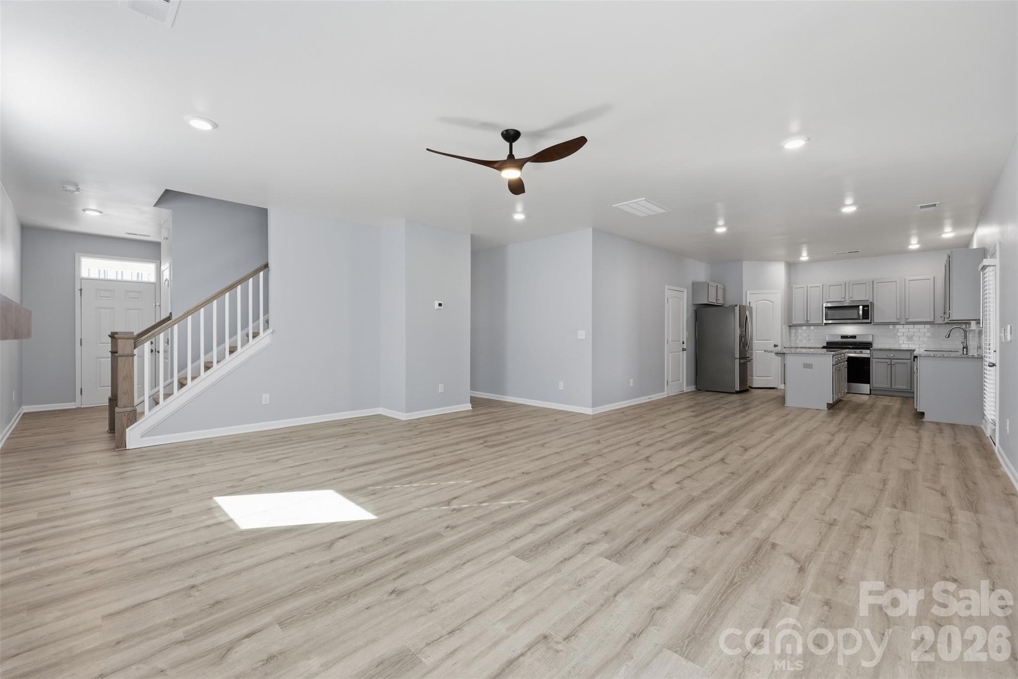 2220 Sussex Road York, SC 29745 - Photo 10 of 42 a view of an empty room with a kitchen