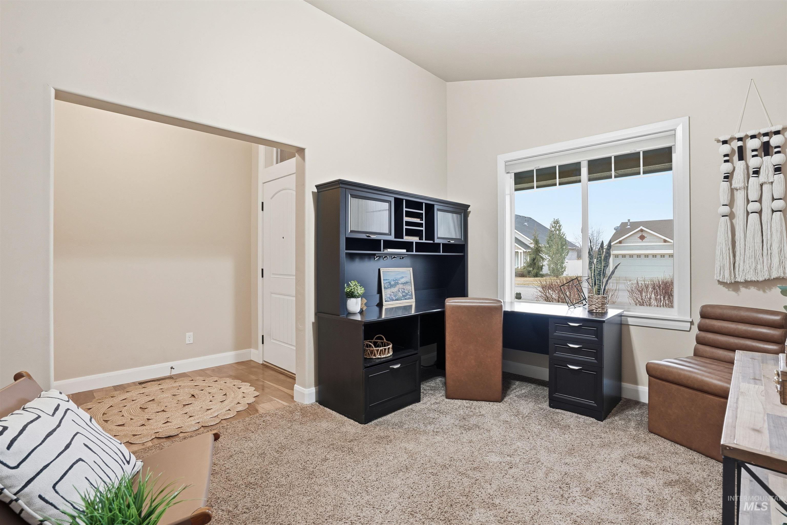 5697 Combermere Drive Eagle, ID 83616 - Photo 27 of 43 Office space with lofted ceiling and light colored carpet