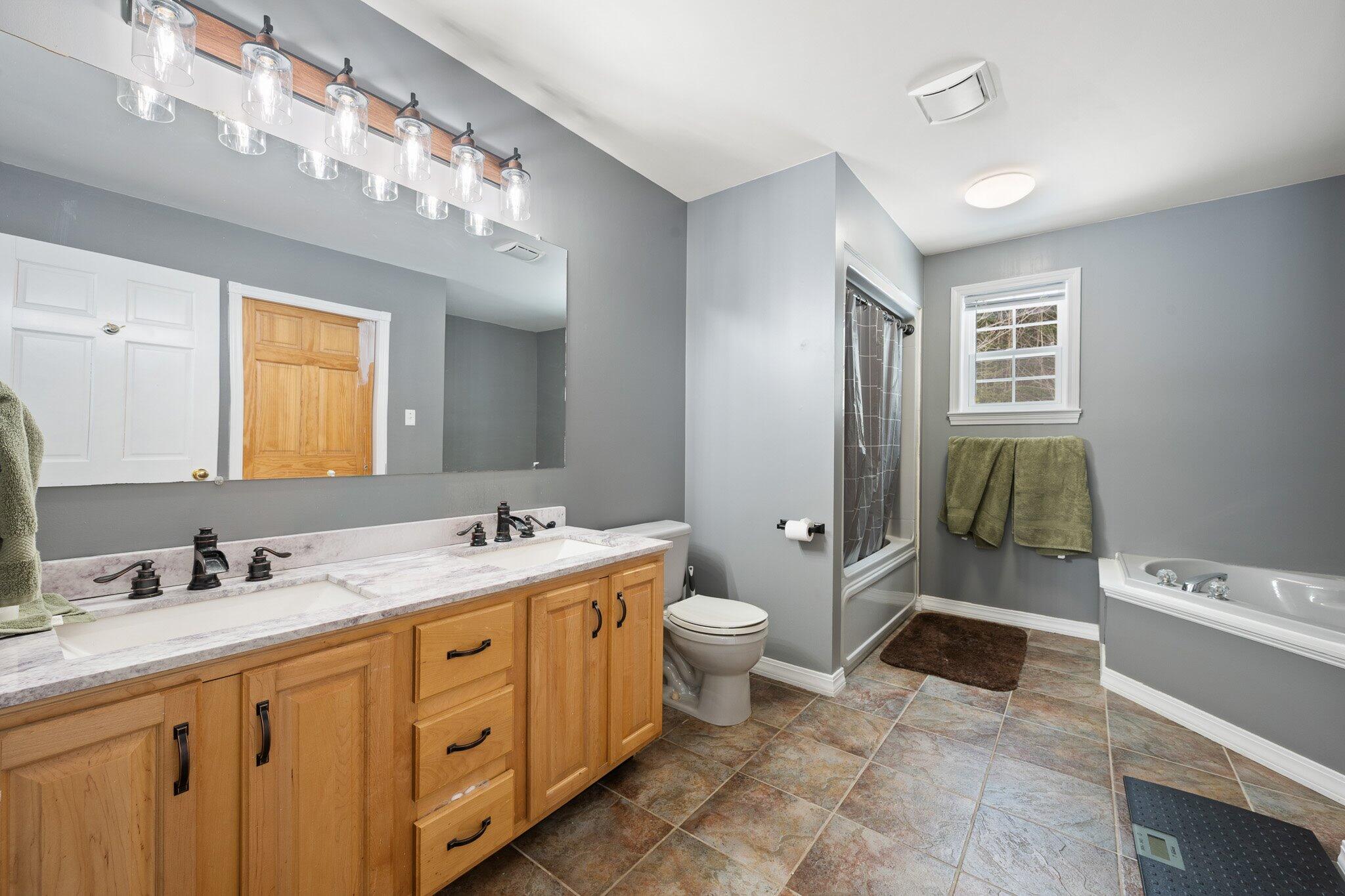 106 Woodfield Way Ellsworth, ME 04605 - Photo 24 of 57 24-Primary Bathroom