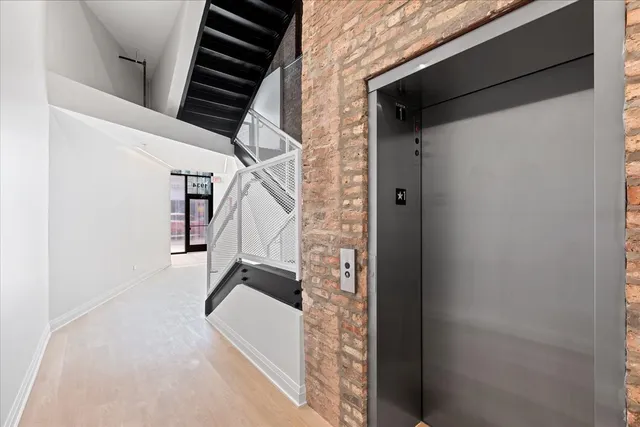 a view of a building with brick walls