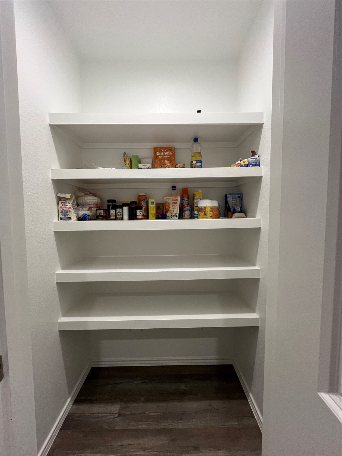 5446 Wyndham Ridge Ln Spring Spring, TX 77373 - Photo 17 of 24 a view of room with racks on the wall