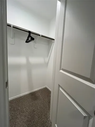 a house with trees in the background