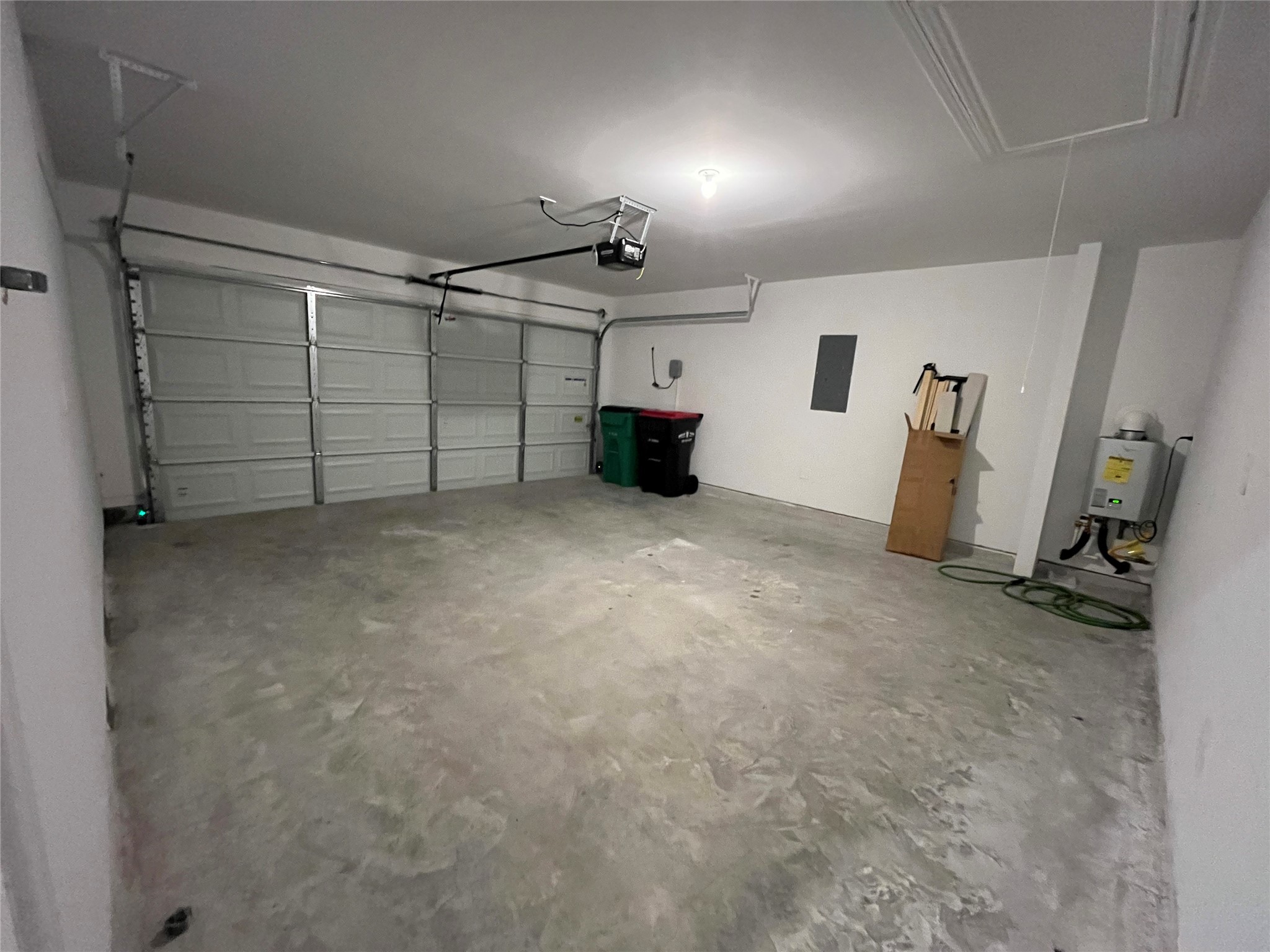 5446 Wyndham Ridge Ln Spring Spring, TX 77373 - Photo 3 of 24 a view of a garage with furniture