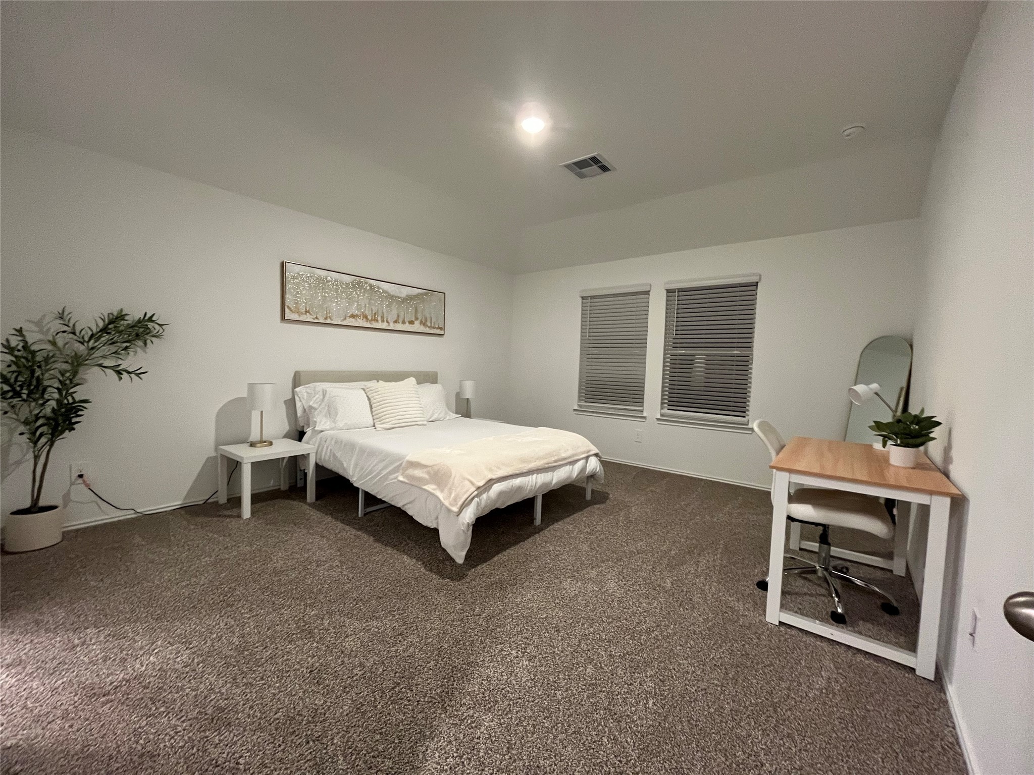 5446 Wyndham Ridge Ln Spring Spring, TX 77373 - Photo 9 of 24 a spacious bedroom with a bed and a window