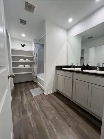 a view of room with cabinets