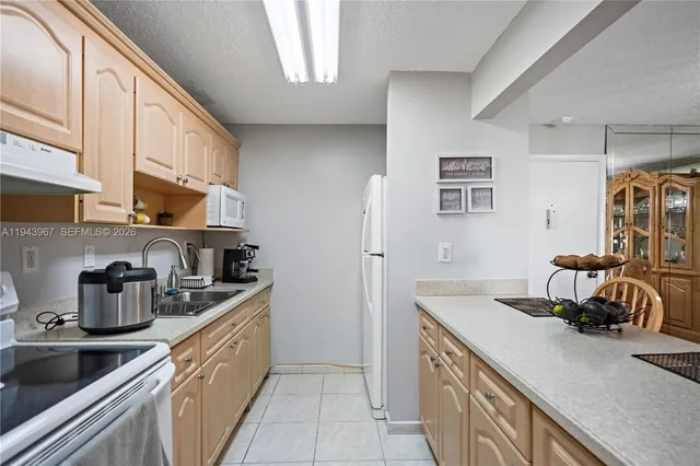 $255,000 | 4670 West 13th Lane, Unit 309, Hialeah, FL 33012