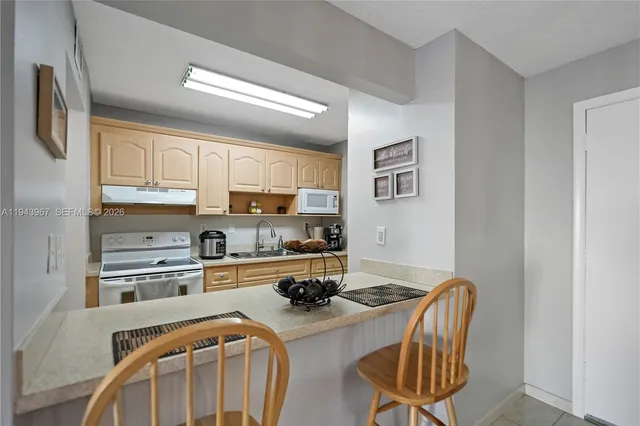 $255,000 | 4670 West 13th Lane, Unit 309, Hialeah, FL 33012