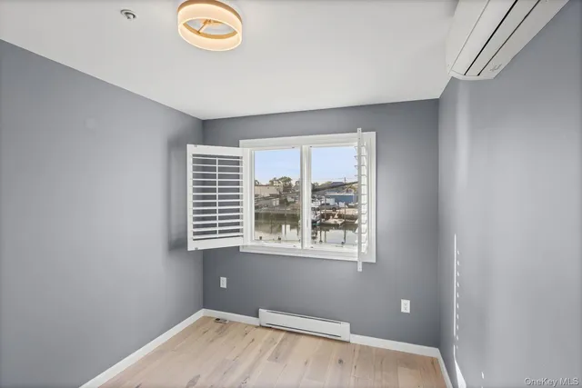 a view of a room that has a window in it