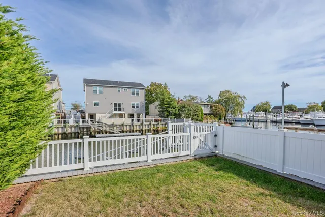 a view of a balcony and yard