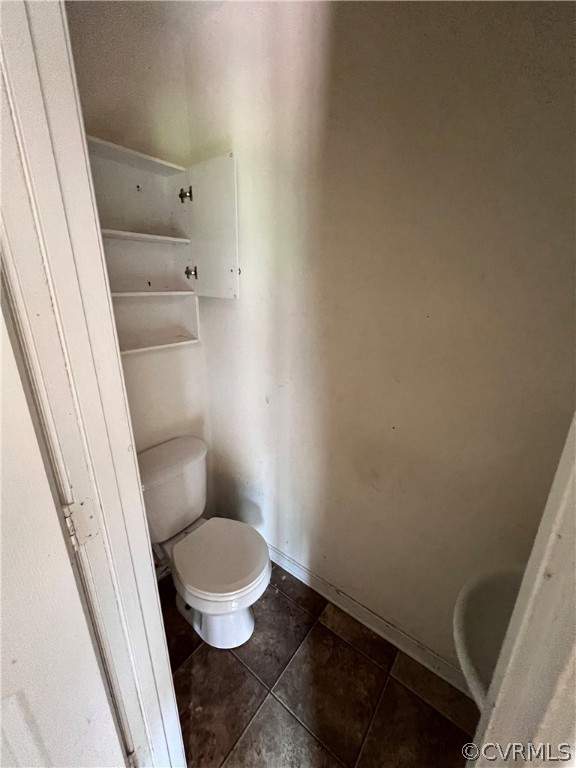 3360 Denise Road Petersburg, VA 23805 - Photo 13 of 22 a bathroom with a toilet and a sink