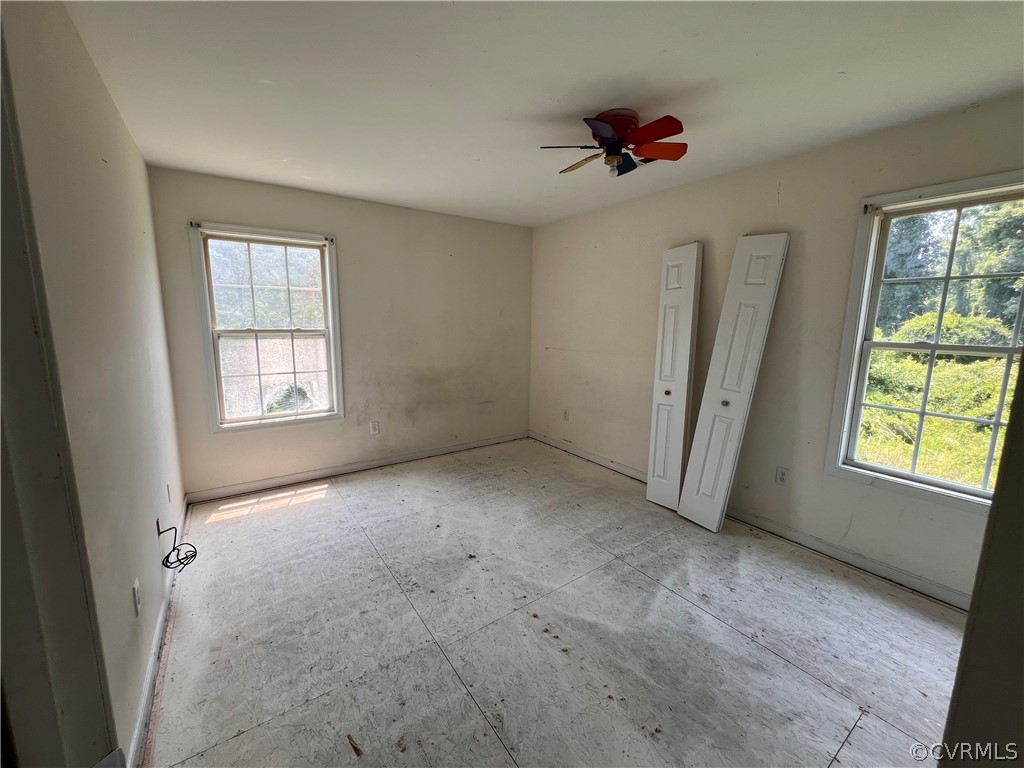 3360 Denise Road Petersburg, VA 23805 - Photo 19 of 22 an empty room with windows and closet