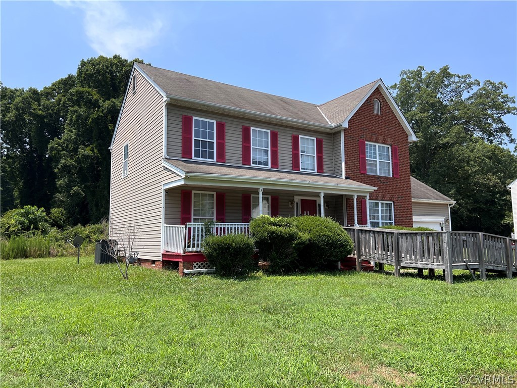 3360 Denise Road Petersburg, VA 23805 - Photo 3 of 22 a house view with a garden space