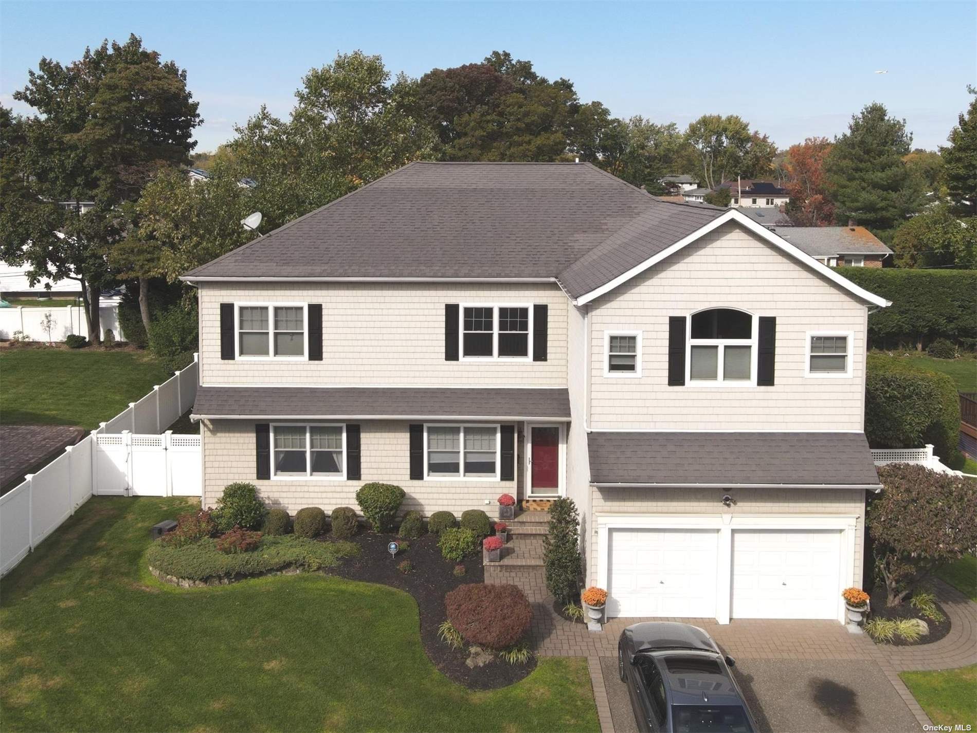 6 Ulster Drive Jericho, NY 11753 - Photo 1 of 1 a front view of a house with a yard