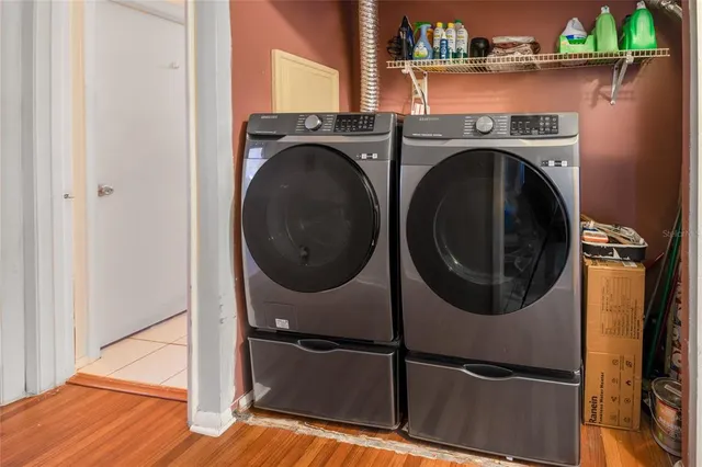 a utility room with dryer and washer