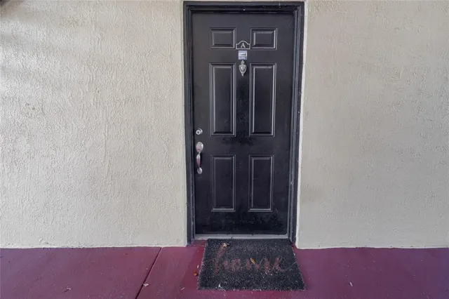 a view of hallway with closet