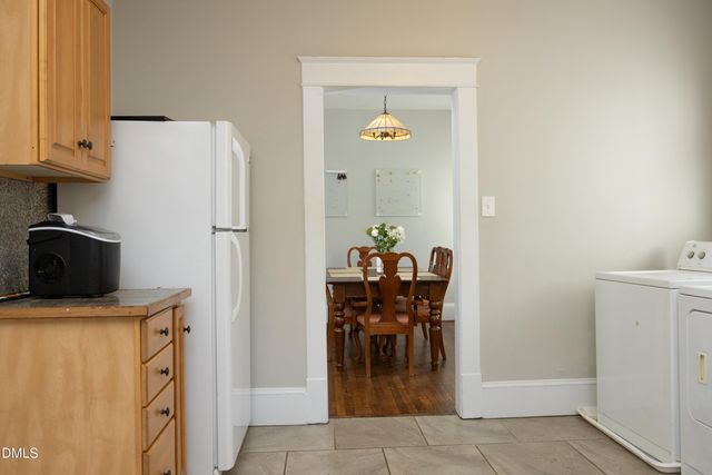 a view of kitchen with furniture and wooden floor