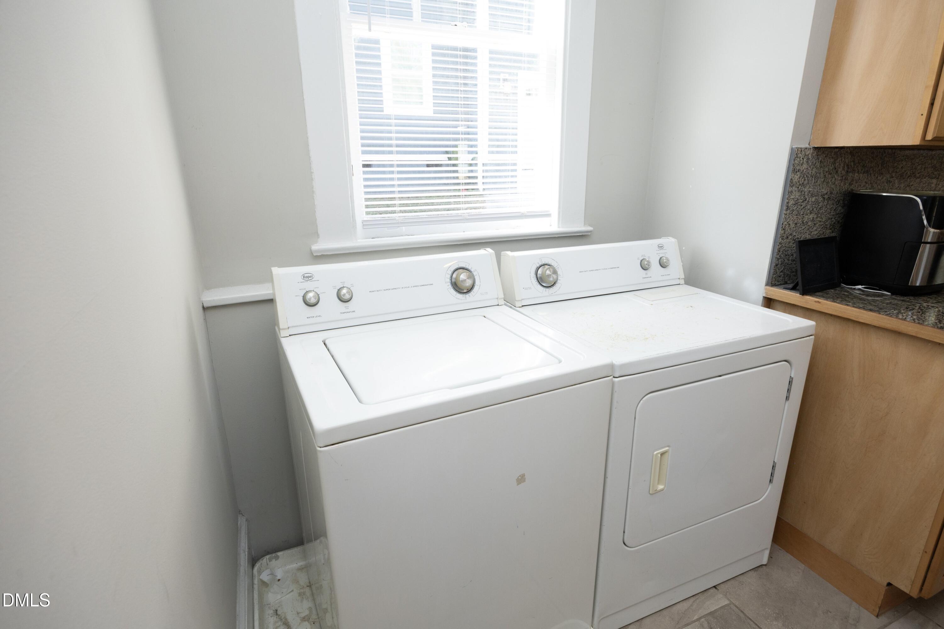 206 Ashe Avenue Raleigh, NC 27605 - Photo 21 of 37 a utility room with dryer and washer