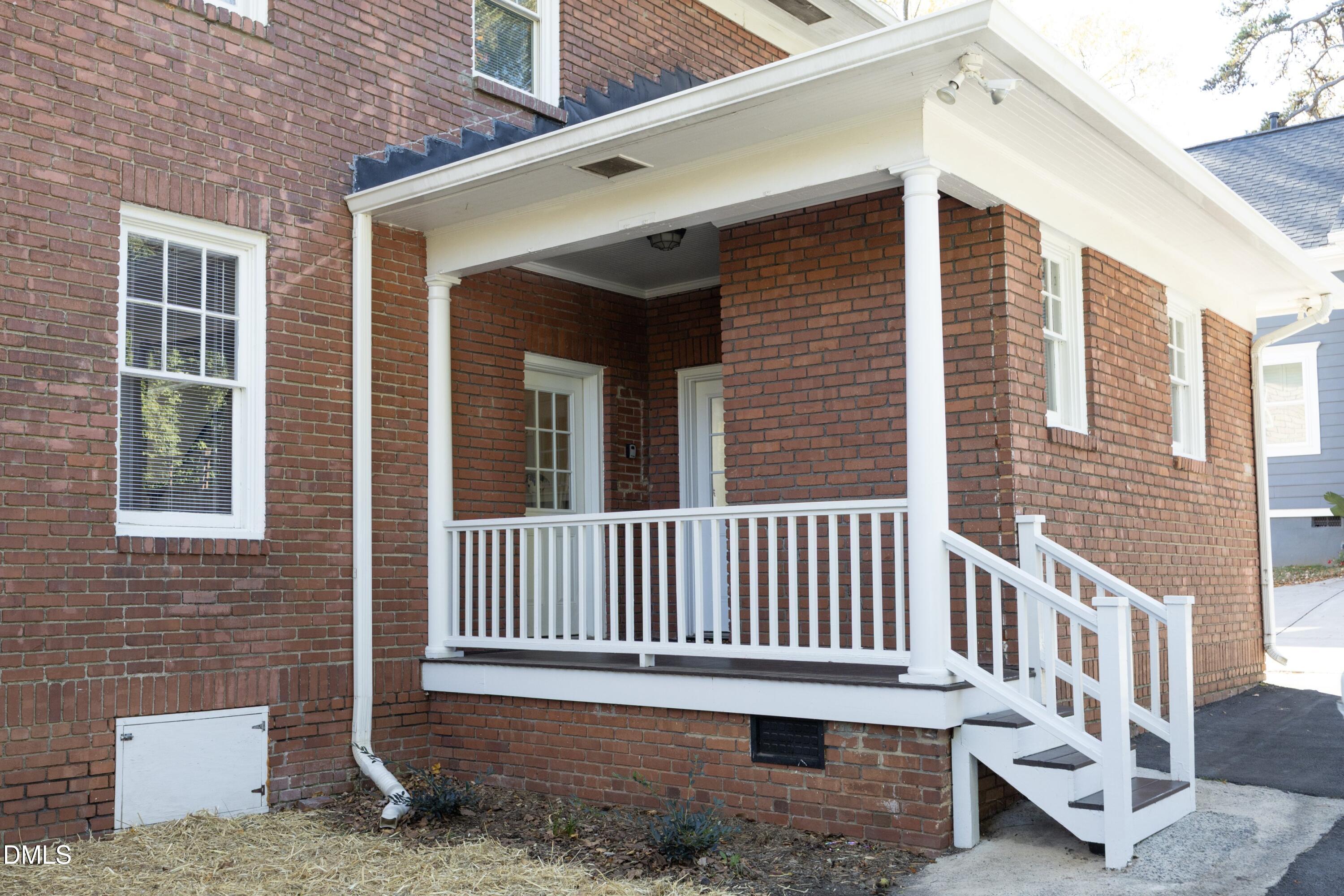 206 Ashe Avenue Raleigh, NC 27605 - Photo 31 of 37 a view of a house with a deck