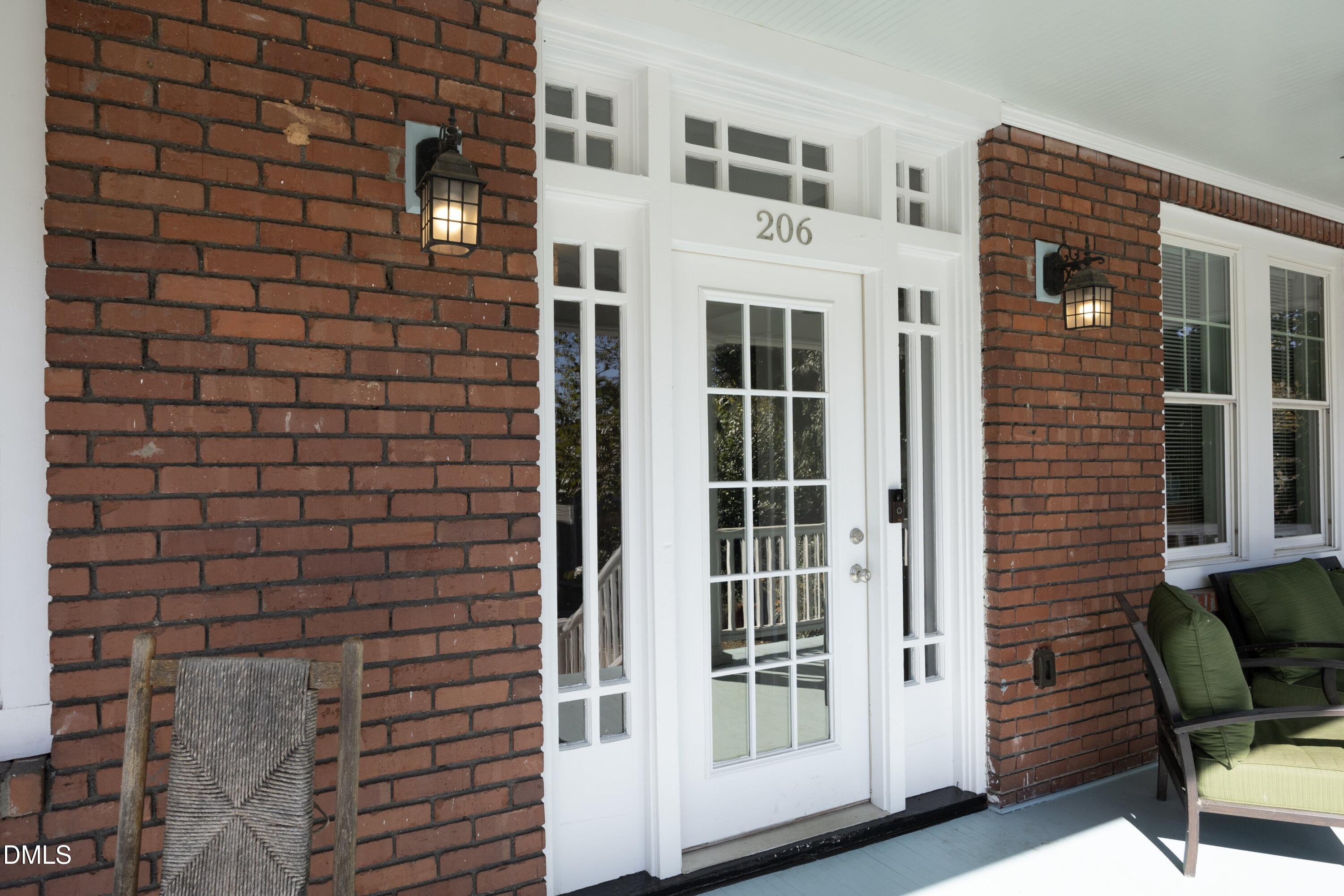206 Ashe Avenue Raleigh, NC 27605 - Photo 4 of 37 a view of front door of house with stairs
