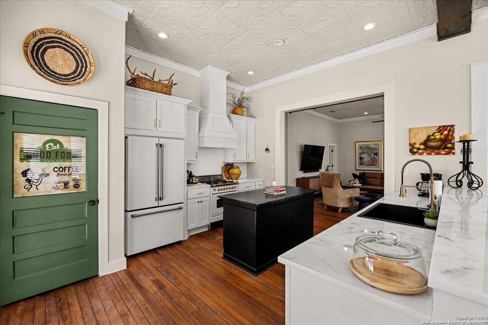1006 High Street Comfort, TX 78013 - Photo 16 of 50 a kitchen with stainless steel appliances granite countertop a refrigerator and a stove top oven