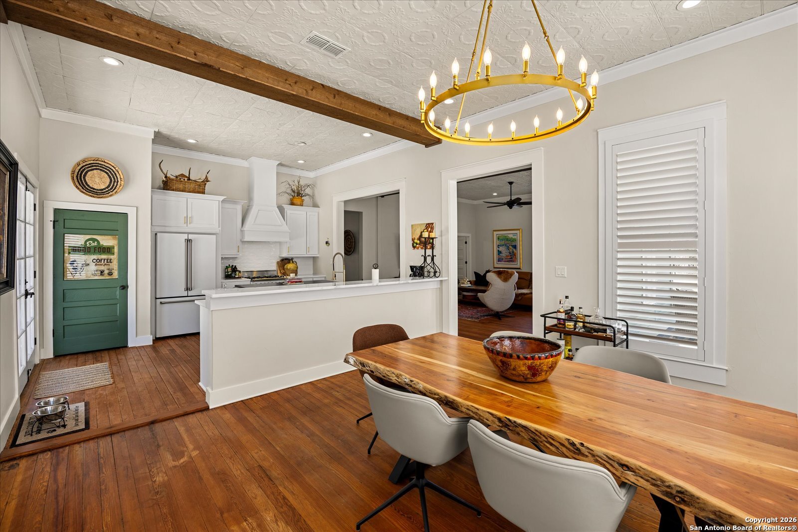 1006 High Street Comfort, TX 78013 - Photo 20 of 50 a room with wooden floor table and chairs