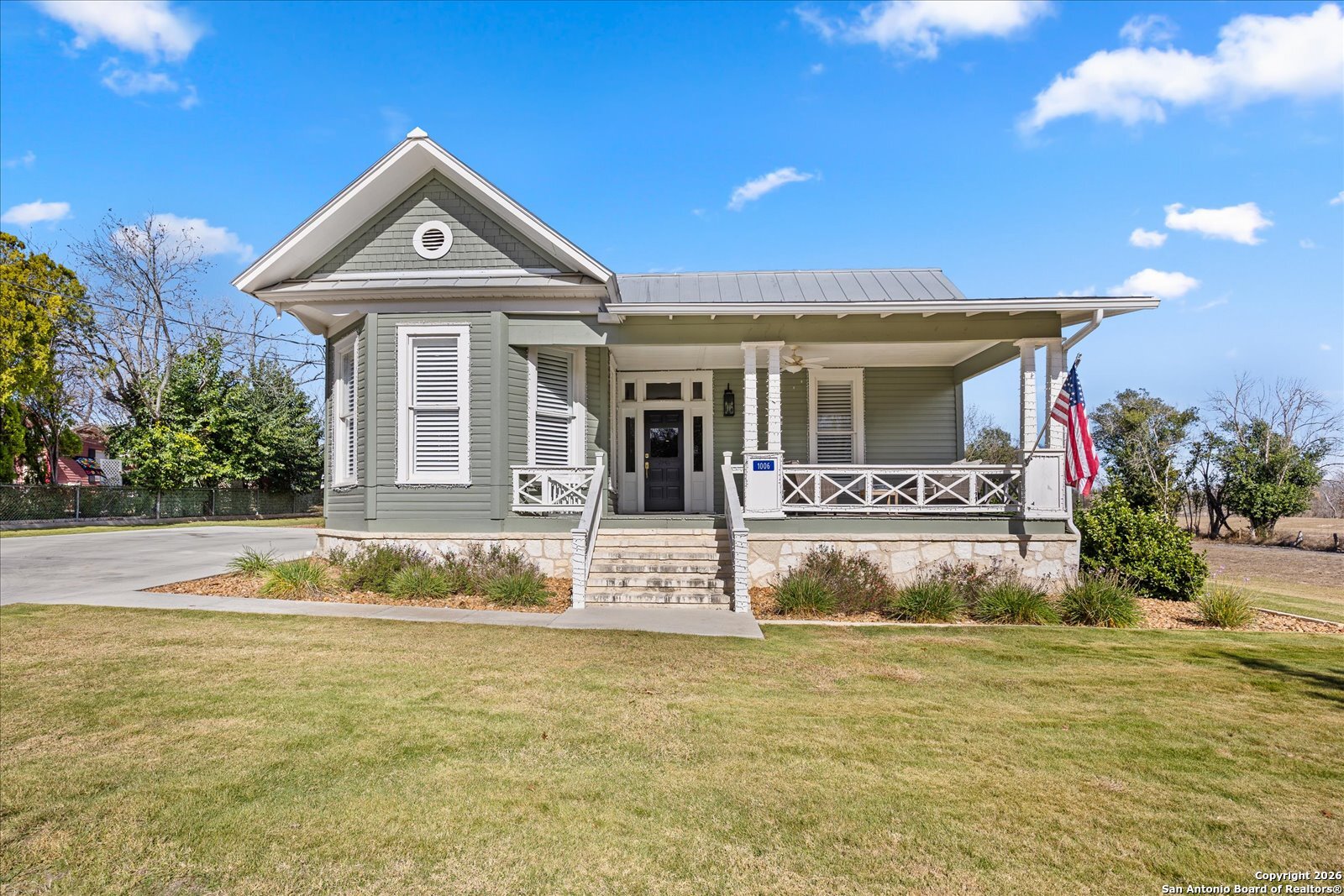 1006 High Street Comfort, TX 78013 - Photo 2 of 50 a front view of a house with swimming pool