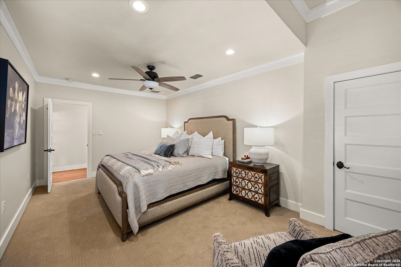 1006 High Street Comfort, TX 78013 - Photo 28 of 50 a bedroom with a bed and a ceiling fan