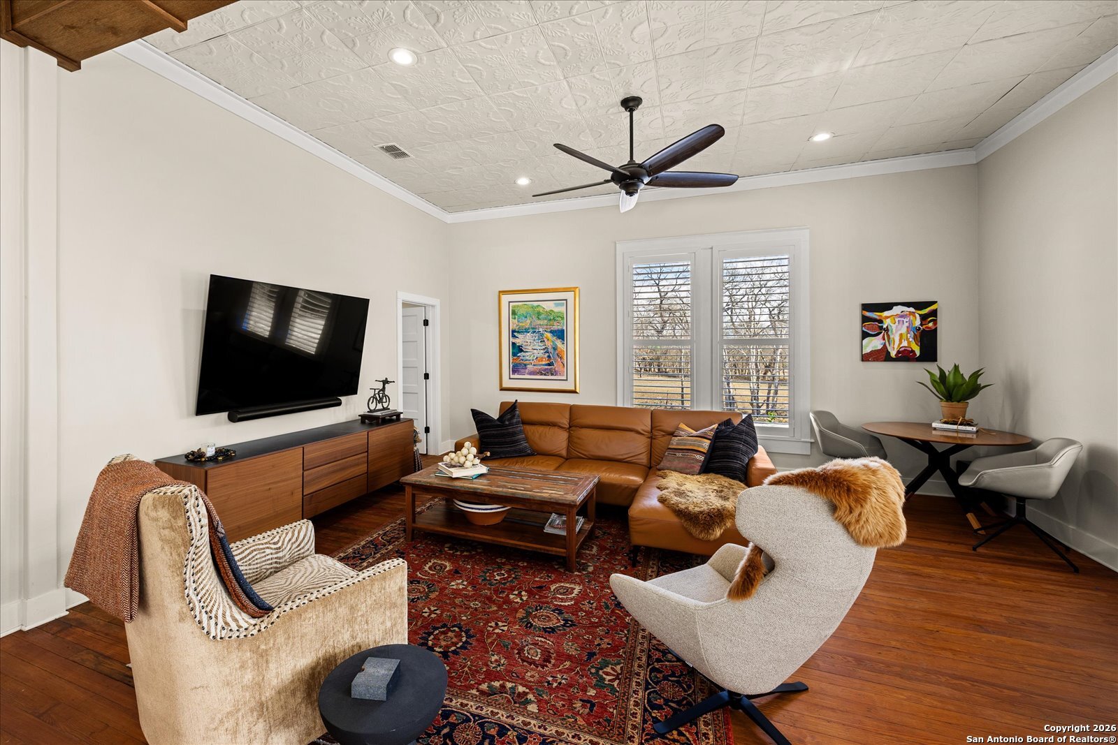 1006 High Street Comfort, TX 78013 - Photo 29 of 50 a living room with furniture and a flat screen tv