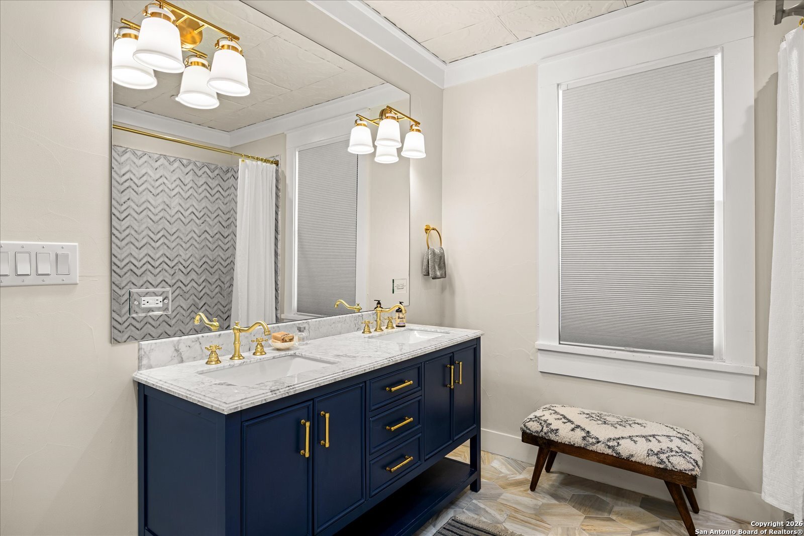 1006 High Street Comfort, TX 78013 - Photo 35 of 50 a bathroom with a sink and a mirror