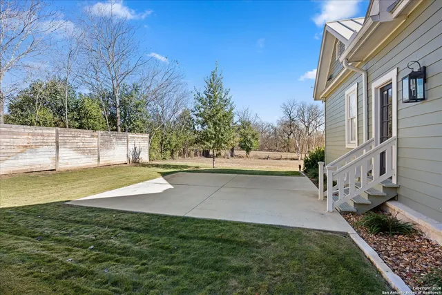 a view of yard with large tree