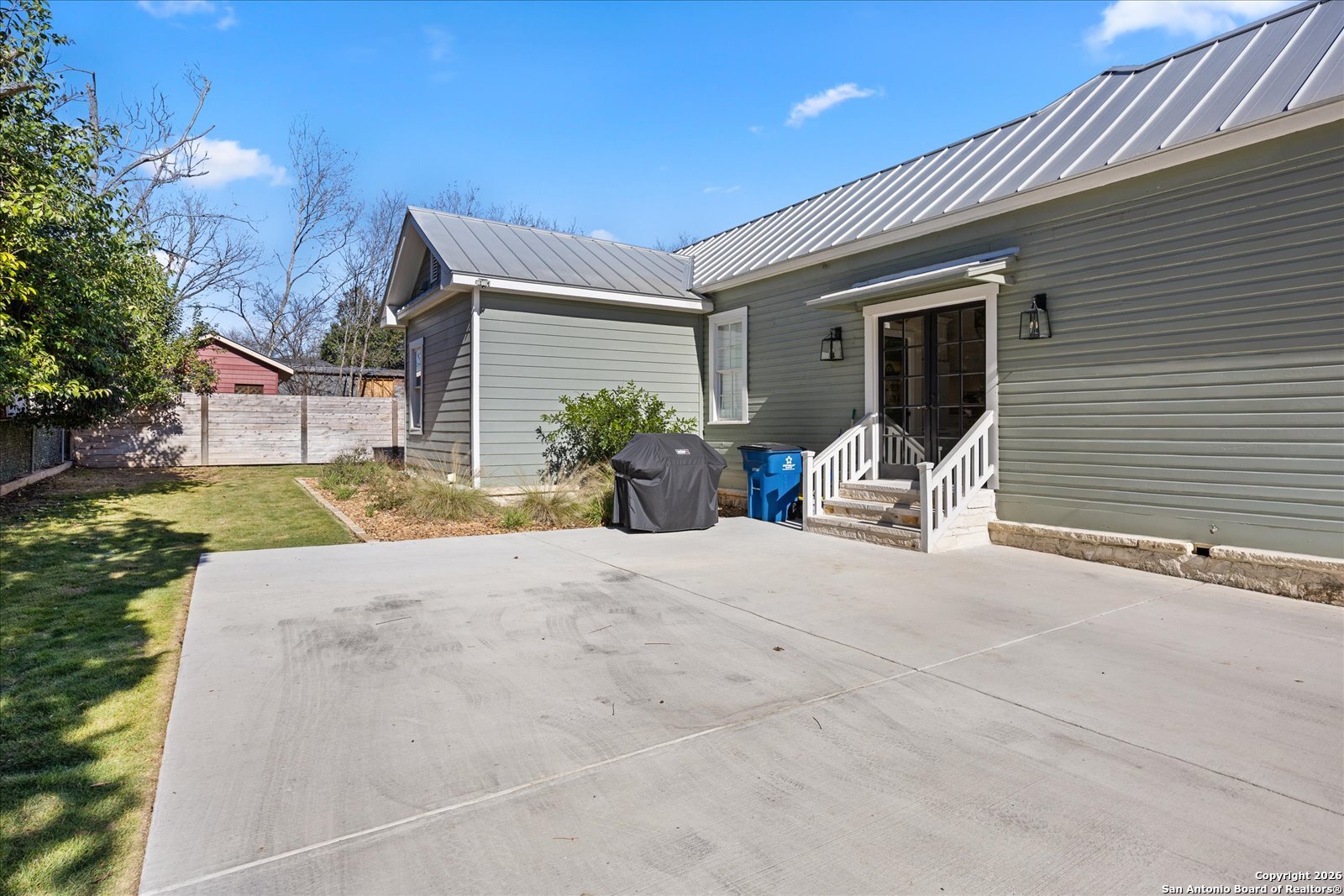 1006 High Street Comfort, TX 78013 - Photo 42 of 50 a house with yard and a garage