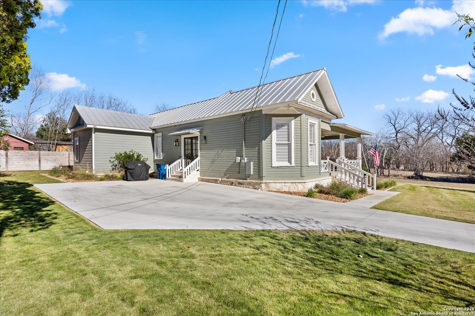 1006 High Street Comfort, TX 78013 - Photo 43 of 50 a front view of a house with a yard