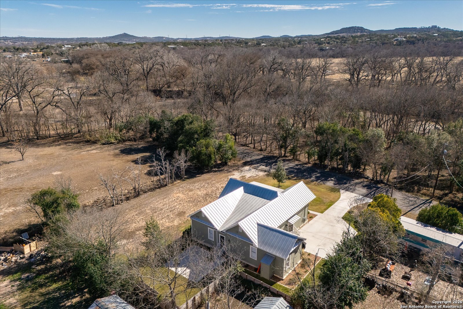 1006 High Street Comfort, TX 78013 - Photo 50 of 50 an aerial view of a house with a yard